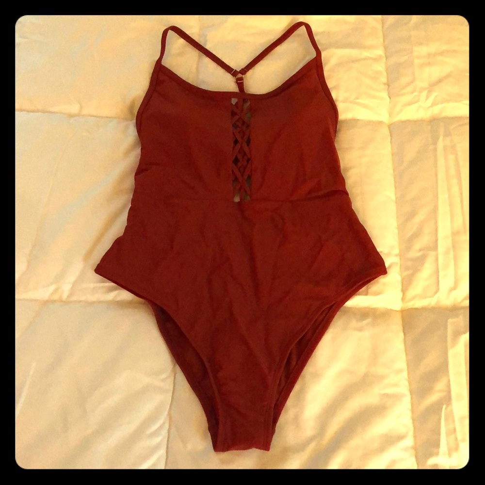 Xhilaration one piece. Rust color. Size small. NWT